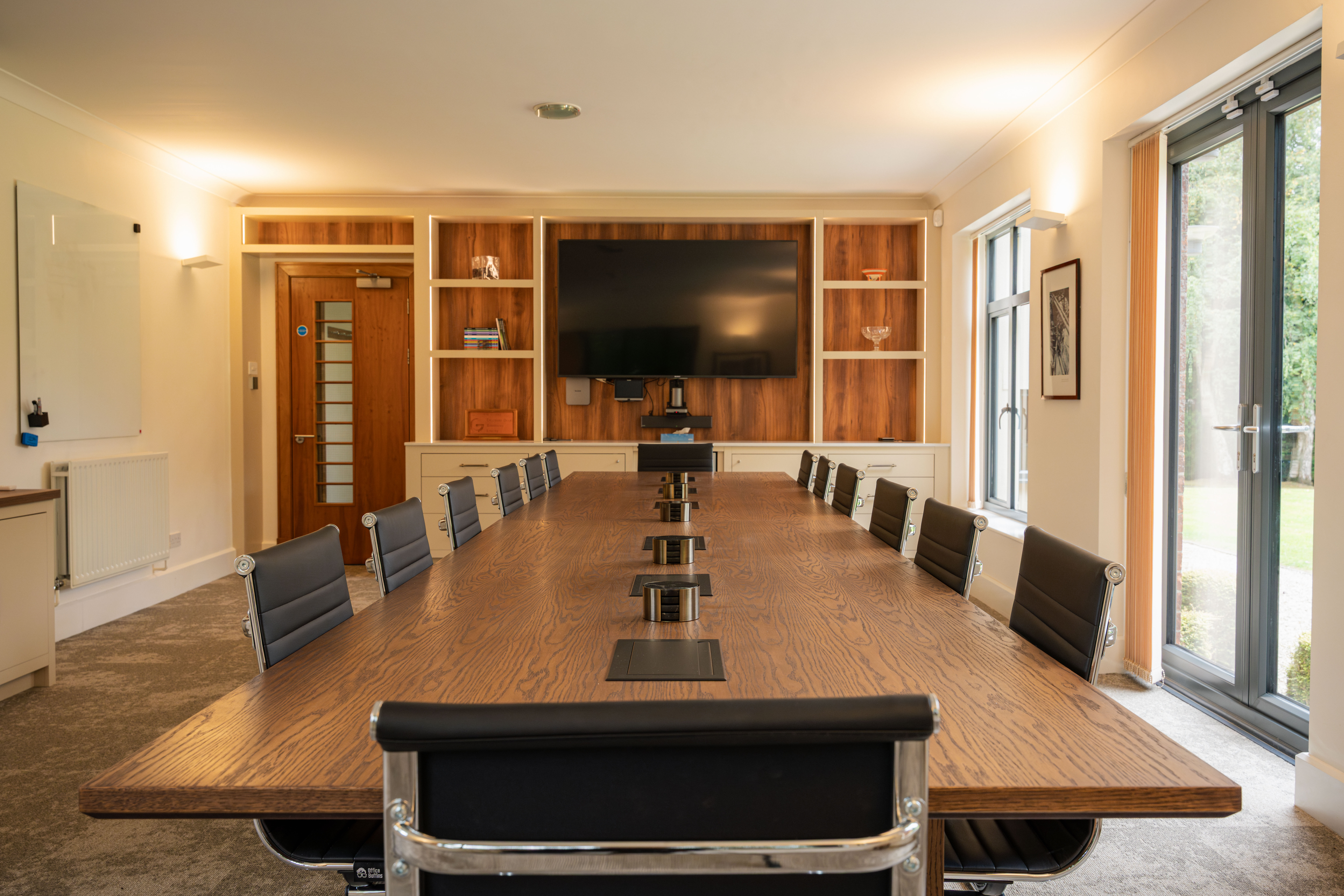Bespoke boardroom with solid oak conference table — Collinson Grant Worsley by Hafferty Interiors