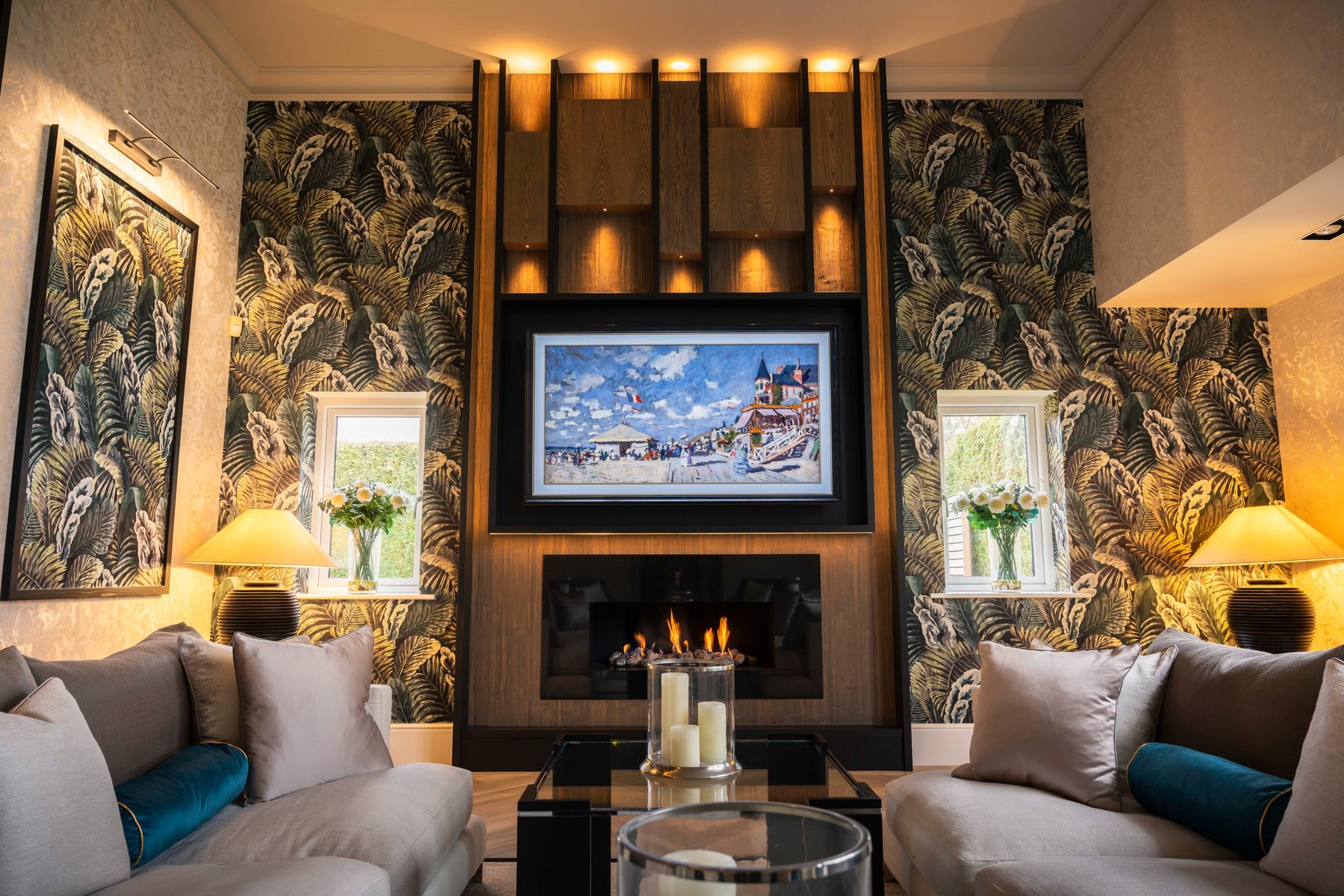 Luxury bespoke living room with floor-to-ceiling oak media wall and living flame fireplace — Hafferty Interiors