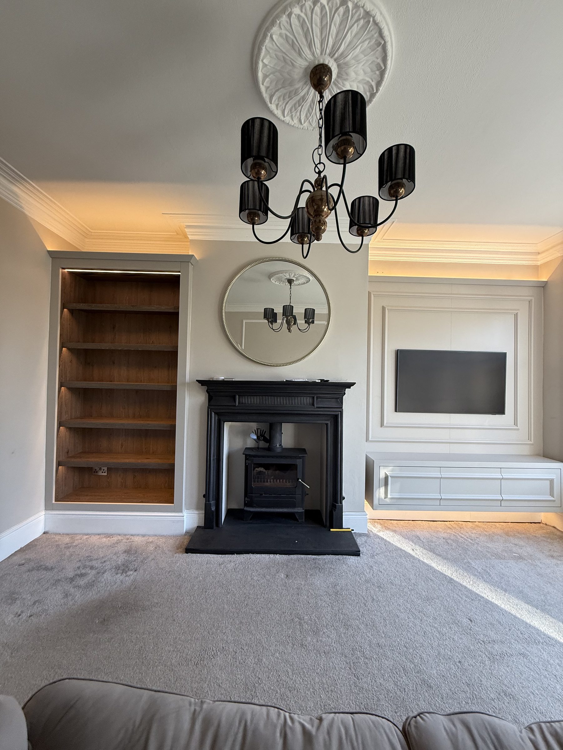 Bespoke fitted media wall and oak alcove bookcase in period Victorian living room — Hafferty Interiors